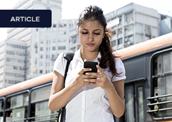 a young Indian women using a smart phone